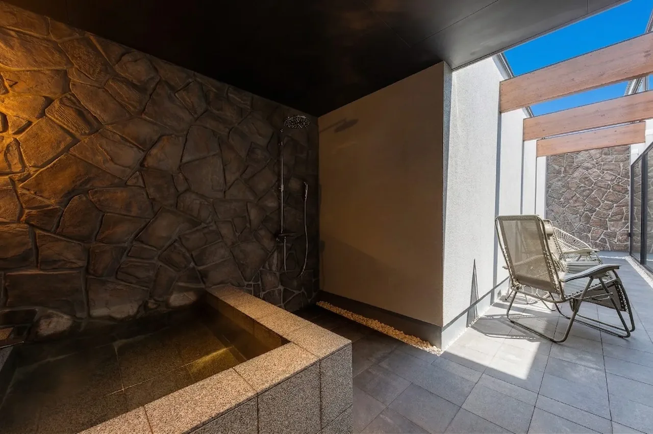Open-air private bath surrounded by Hokkaido nature