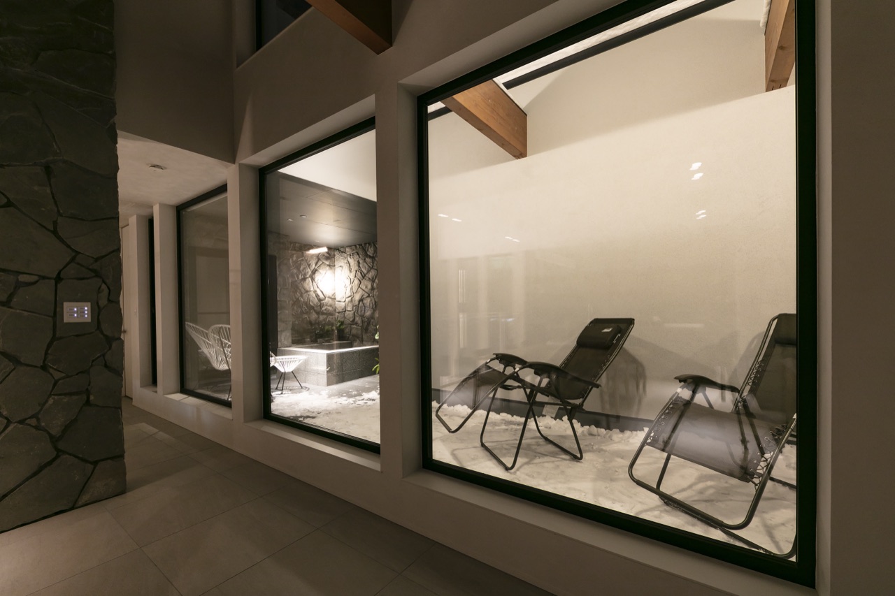 Outdoor cool-down lounge with reclining chairs